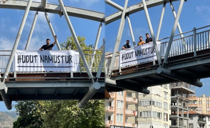 Yılmaz, üst geçitlere ‘Hudut Namustur’ yazılı pankart astı